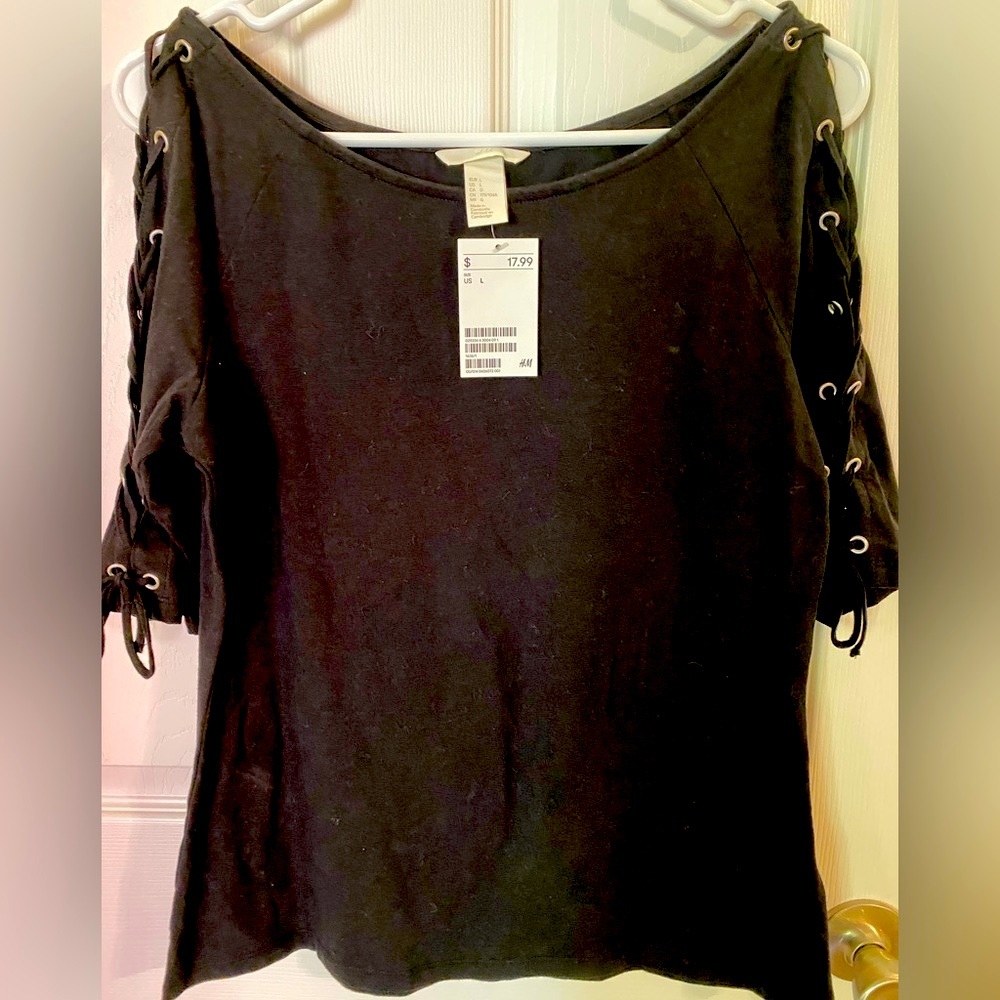 H&M Black Short Sleeve Top. Size large. Lace up detail on sleeves. NWT